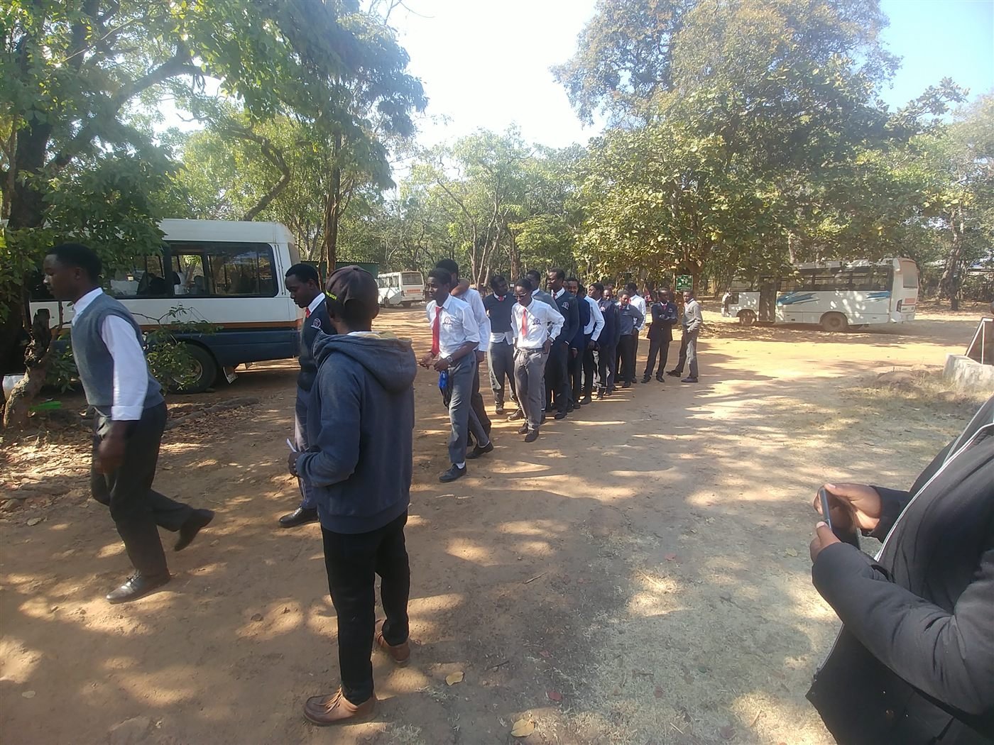 Libarti Boys students walking through the grounds during their Chimfunshi educational visit