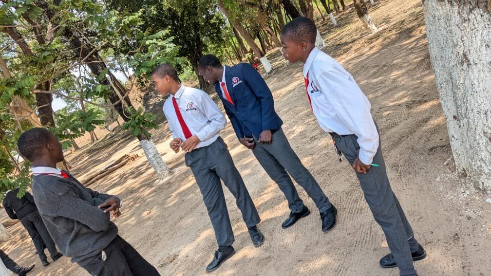 Libarti Boys students spending time together on campus