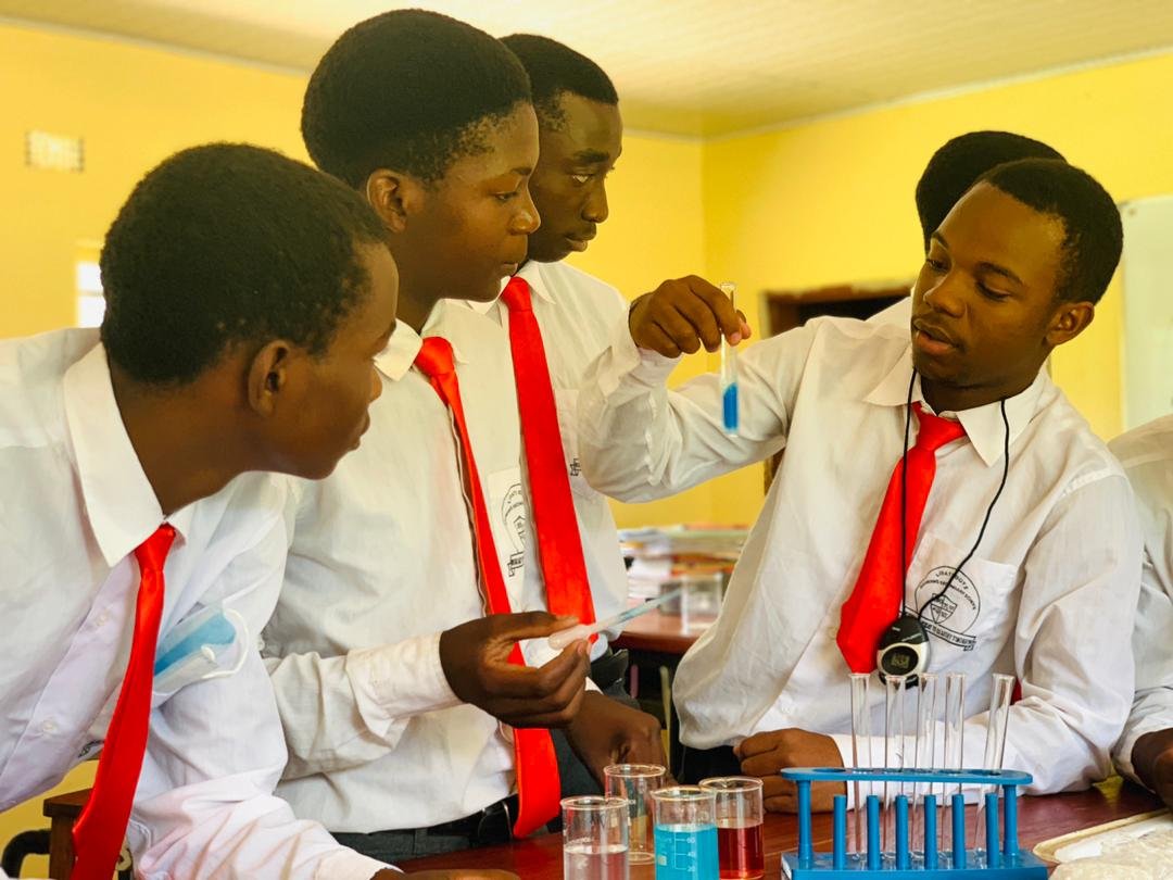 Libarti Boys students conducting a science experiment