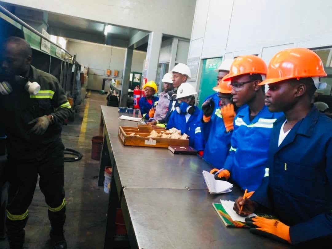 Students listening to an industry professional during the Mopani visit